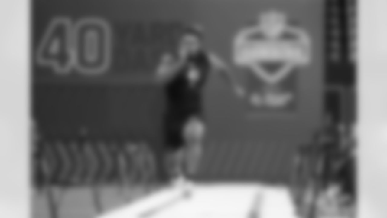 Texas A&M defensive lineman Cashius Howell (41) runs the 40-yard dash at the NFL football scouting combine in Indianapolis, Thursday, Feb. 26, 2026. (AP Photo/Julio Cortez)