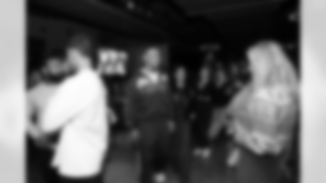 Detroit Lions wide receiver Amon-Ra St. Brown (14) greets guests during a Strike for Literacy event at Five Iron Golf on Nov. 3, 2025 in Detroit.(Carl Jones II/Detroit Lions)