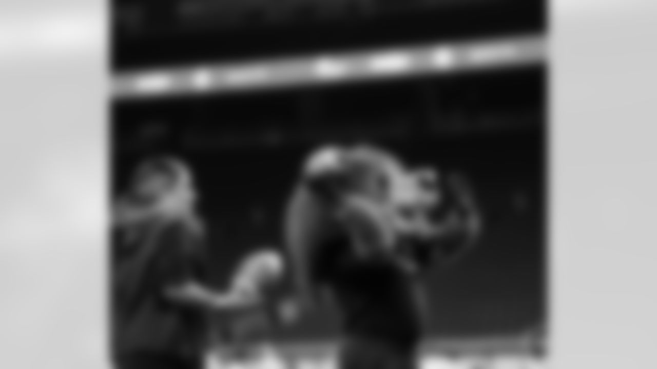 Detroit Lions Mascot Roary throwing a football during the Inspire Change Football Clinic at Ford Field on Dec. 9, 2025 in Detroit. (Izzy Rincon/Detroit Lions)