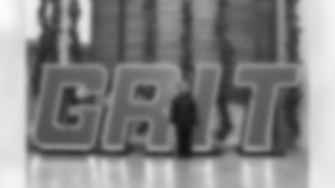 A Cub Club member poses for a photo during the Cub Club Wild Lights event at the Detroit Zoo on Dec. 10, 2025 in Royal Oak, Mich. (Stephanie VanWagoner/Detroit Lions)