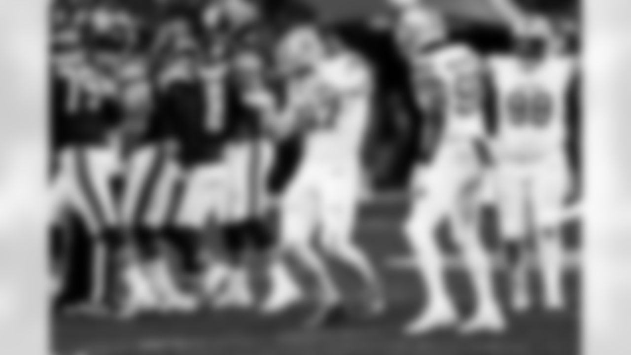 Detroit Lions edge rusher Aidan Hutchinson (97) celebrates during an NFL football game against the Chicago Bears on Sunday, Jan. 4, 2026 in Chicago. (Jeff Nguyen/Detroit Lions via AP)