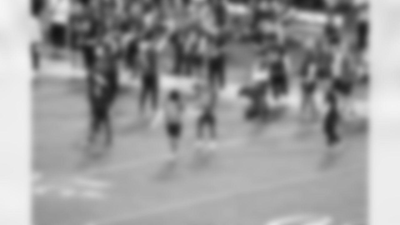 Detroit Lions running back Jahmyr Gibbs (26) and Detroit Lions defensive back Brian Branch (32) celebrate Gibbs' conversion attempt interception at the 2025 Pro Bowl Games in Orlando, FL on February 2, 2025. (Stuart Zaas/Detroit Lions via AP)