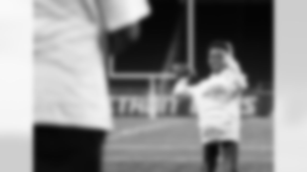 A participant doing a drill at the quarterback station during the Inspire Change Football Clinic at Ford Field on Dec. 9, 2025 in Detroit. (Izzy Rincon/Detroit Lions)