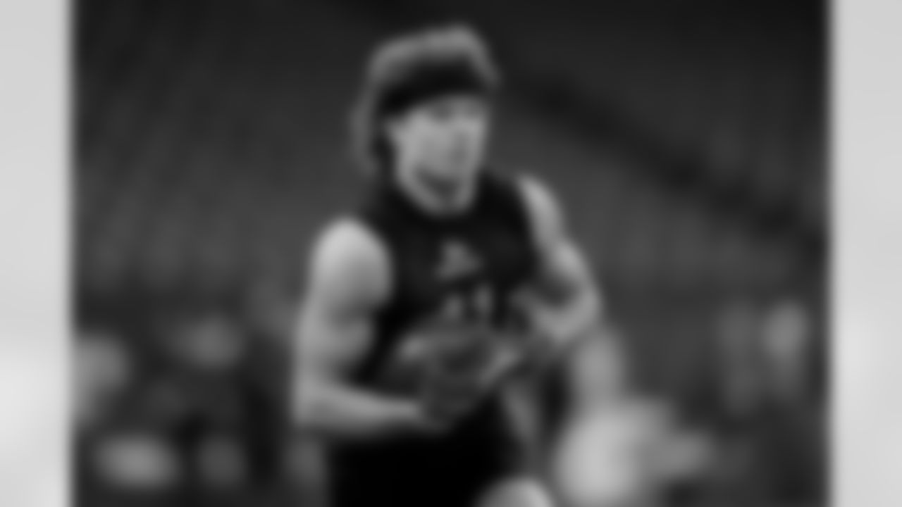 Arkansas wide receiver Isaac TeSlaa runs a drill at the NFL football scouting combine in Indianapolis, Saturday, March 1, 2025. (AP Photo/George Walker IV)