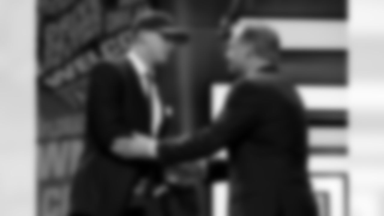 Detroit Lions quarterback Jared Goff (16) shakes hands with NFL commissioner Roger Goodell after being selected by the Los Angeles Rams as the first pick in the first round of the 2016 NFL football draft, Thursday, April 28, 2016, in Chicago. (AP Photo/Charles Rex Arbogast)