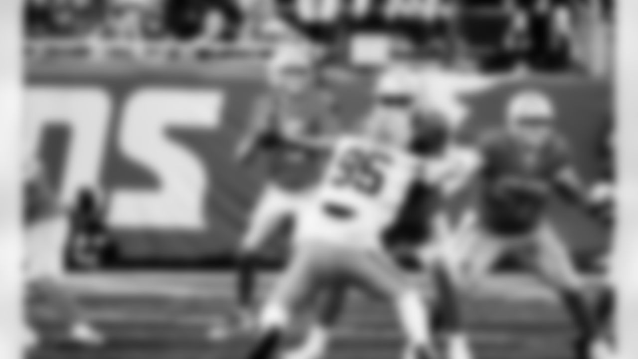 Detroit Lions quarterback Jared Goff (16) and Detroit Lions offensive lineman Trystan Colon (57) during an NFL football game against the Green Bay Packers on Thursday, Nov. 27, 2025 in Detroit. (Jeff Nguyen/Detroit Lions via AP)