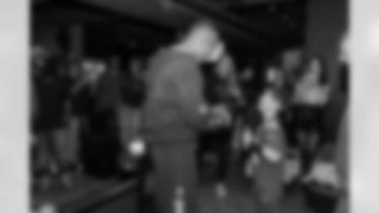 Detroit Lions wide receiver Amon-Ra St. Brown (14) greets guests during a Strike for Literacy event at Five Iron Golf on Nov. 3, 2025 in Detroit.(Carl Jones II/Detroit Lions)