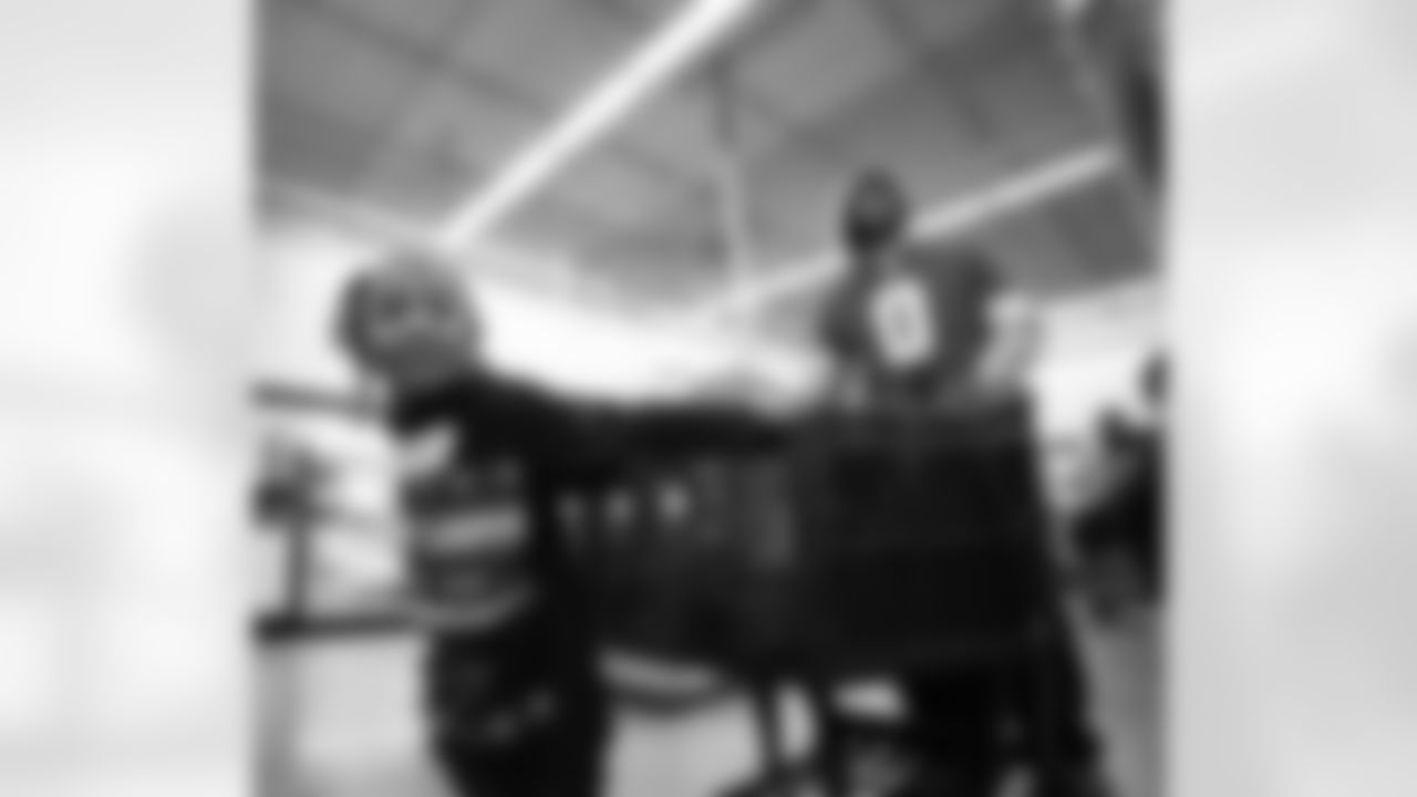 A participant shopping with Detroit Lions running back Jahmyr Gibbs (0) during Shop with a Lion at Meijer on Dec. 8, 2025 in Detroit. (Izzy Rincon/Detroit Lions)