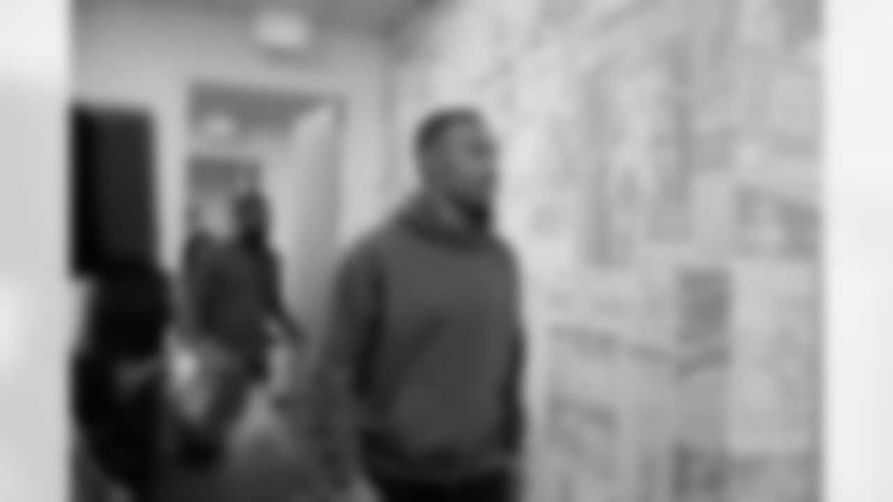 Detroit Lions wide receiver Amon-Ra St. Brown (14) greets students during a shoe design competition event at the Meijer Performance Center on Sept. 27, 2025 in Allen Park, Mich. (Carl Jones II/Detroit Lions via AP)