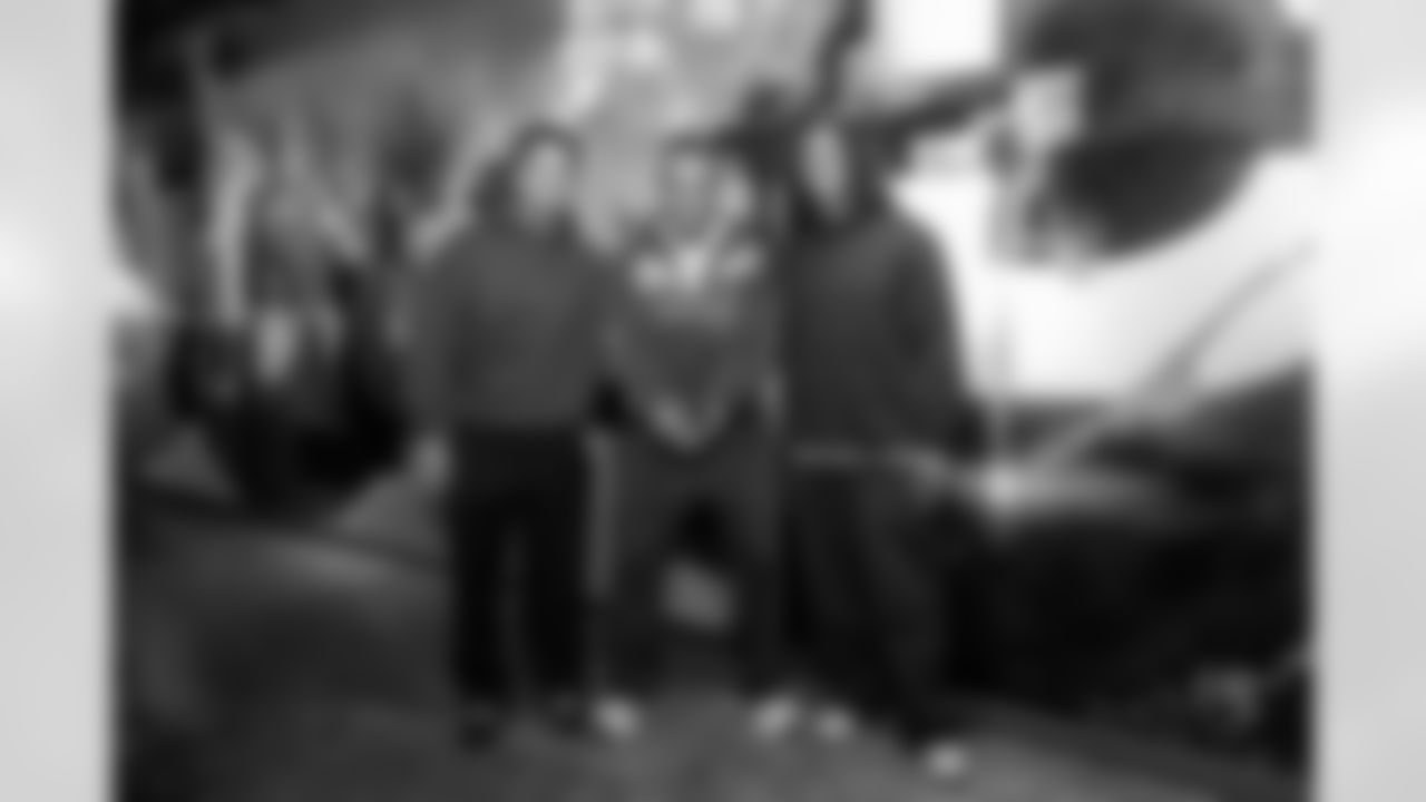 Detroit Lions running back Craig Reynolds (13), Detroit Lions wide receiver Amon-Ra St. Brown (14) and Detroit Lions running back Jahmyr Gibbs (0) during a Strike for Literacy event at Five Iron Golf on Nov. 3, 2025 in Detroit.(Carl Jones II/Detroit Lions)