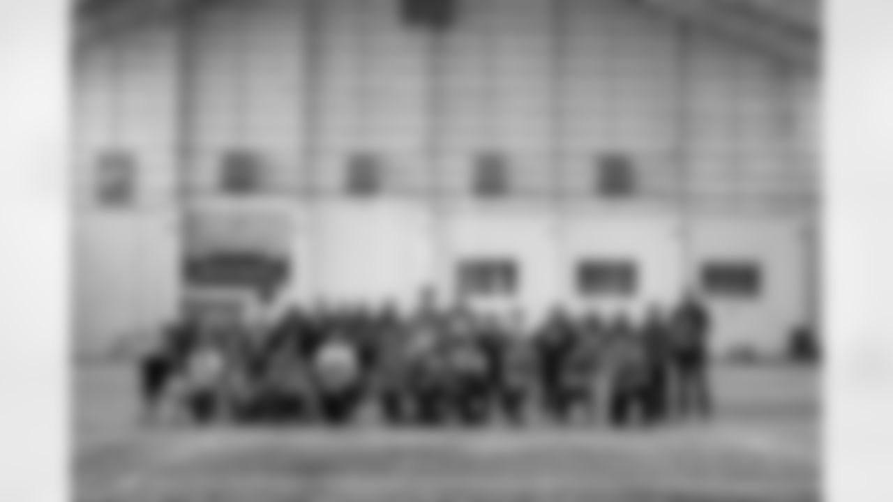 Students of the East Jordan Shoe Club tour the practice field following a shoe design competition event at the Meijer Performance Center on Sept. 27, 2025 in Allen Park, Mich. (Carl Jones II/Detroit Lions via AP)