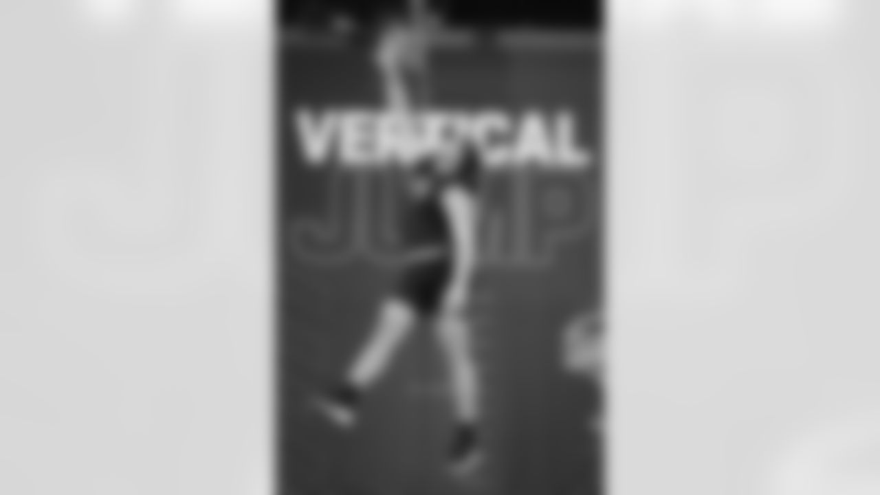 Georgia offensive lineman Monroe Freeling (24) runs a drill at the NFL football scouting combine in Indianapolis, Sunday, March 1, 2026. (AP Photo/Julio Cortez)