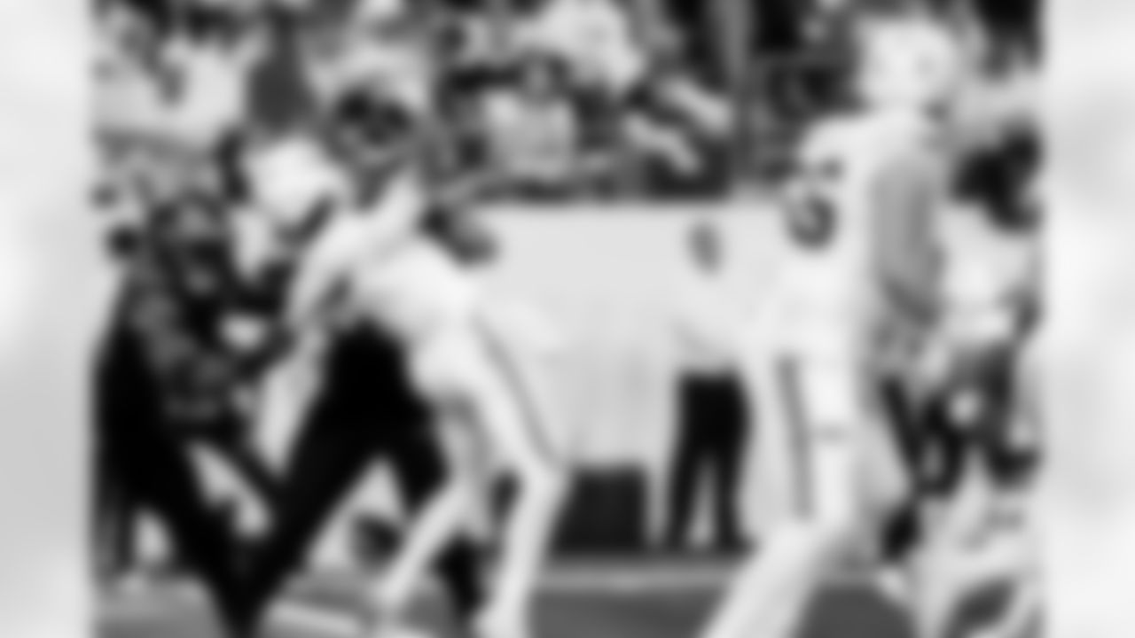 Detroit Lions edge rusher Al-Quadin Muhammad (96) and Detroit Lions defensive lineman Roy Lopez (51) during an NFL football game against the Minnesota Vikings on Thursday, Dec. 25, 2025 in Minneapolis. (Jeff Nguyen/Detroit Lions via AP)