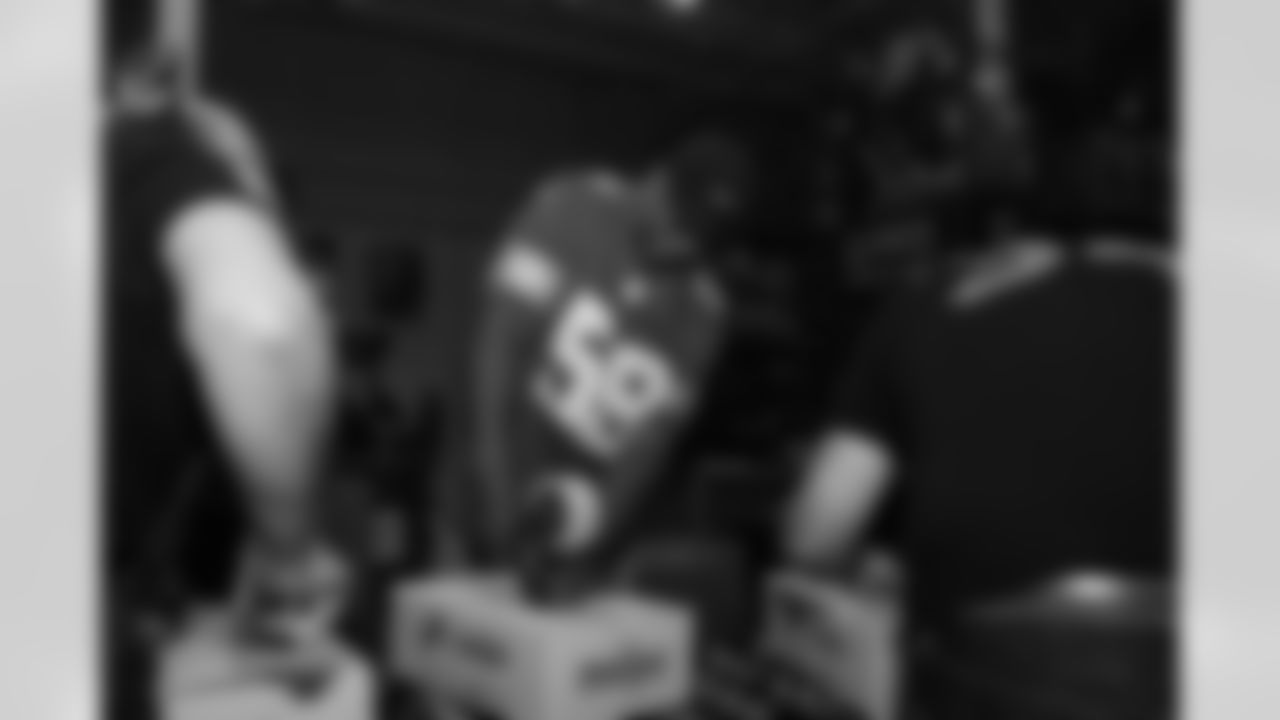 Lions Legend Jimmy Williams (59) taping boxes during a Thanksgiving meal packing event at Gleaners Community Food Bank on Oct. 14, 2025 in Taylor, Mich. (Izzy Rincon/Detroit Lions)