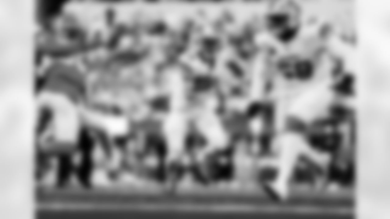 Detroit Lions wide receiver Amon-Ra St. Brown (14) and Detroit Lions tackle Penei Sewell (58) during an NFL football game against the Los Angeles Rams on Sunday, Dec. 14, 2025 in Inglewood, Calif. (Jeff Nguyen/Detroit Lions via AP)