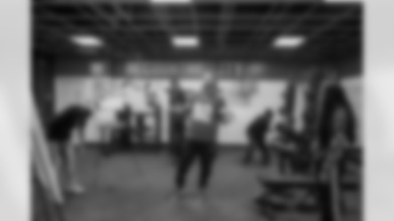 Lions Legend Eric Stocz (82) works with students during a Health and Wellness room reveal during a Count Day activation event at Detroit Lions Academy on Feb. 11, 2026 in Detroit. (Carl Jones II/Detroit Lions)