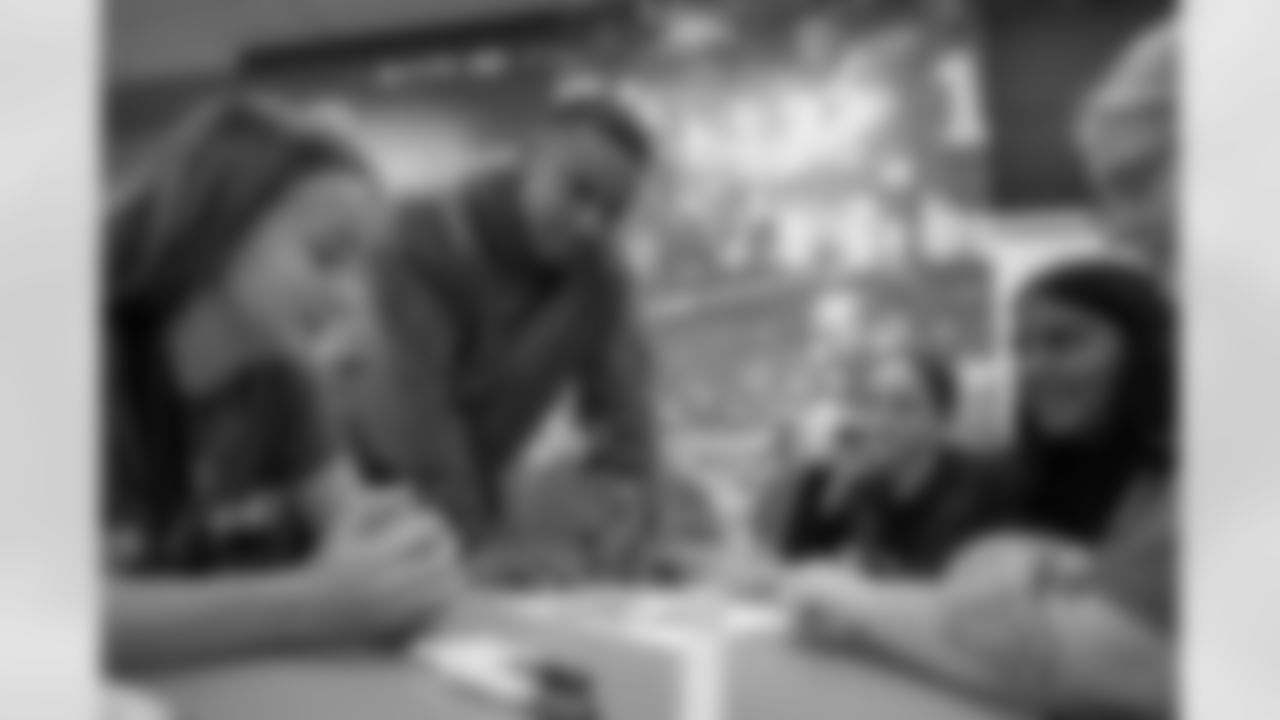 Detroit Lions wide receiver Amon-Ra St. Brown (14) meets with each design group during a shoe design competition event at the Meijer Performance Center on Sept. 27, 2025 in Allen Park, Mich. (Carl Jones II/Detroit Lions via AP)