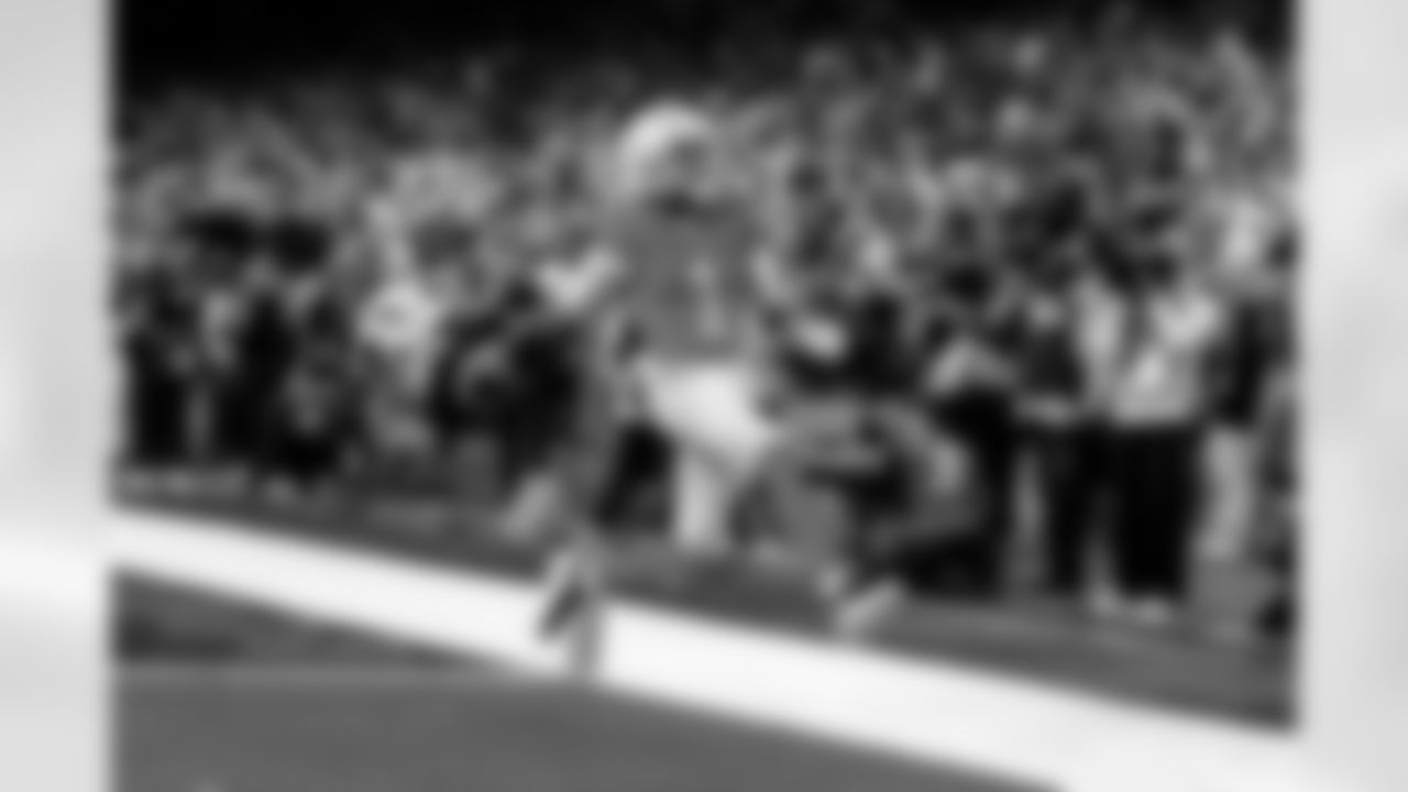 Detroit Lions wide receiver Jameson Williams (1) scores a touchdown during an NFL football game against the Green Bay Packers on Thursday, Nov. 27, 2025 in Detroit. (Jeff Nguyen/Detroit Lions via AP)