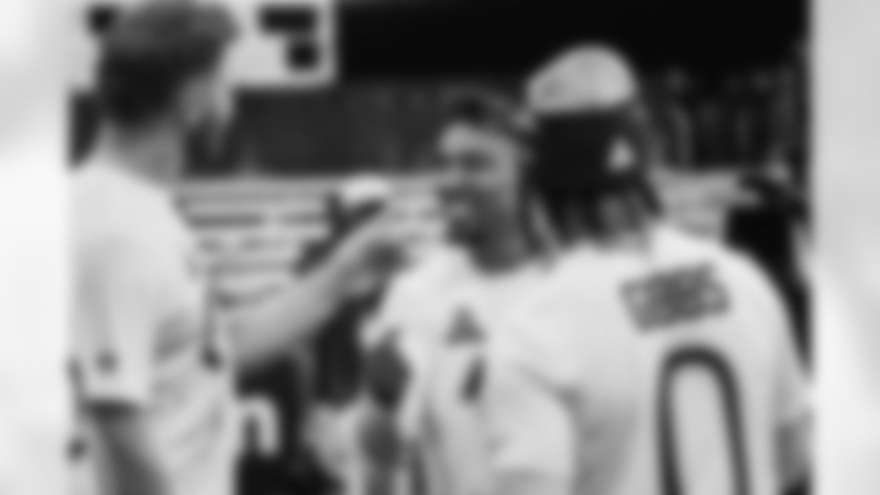 Detroit Lions edge rusher Aidan Hutchinson (97) and Detroit Lions wide receiver Amon-Ra St. Brown (14) with Detroit Lions running back Jahmyr Gibbs (0) at Pro Bowl Games practice on Feb. 1, 2026 in San Francisco, California. (Stuart Zaas/Detroit Lions)