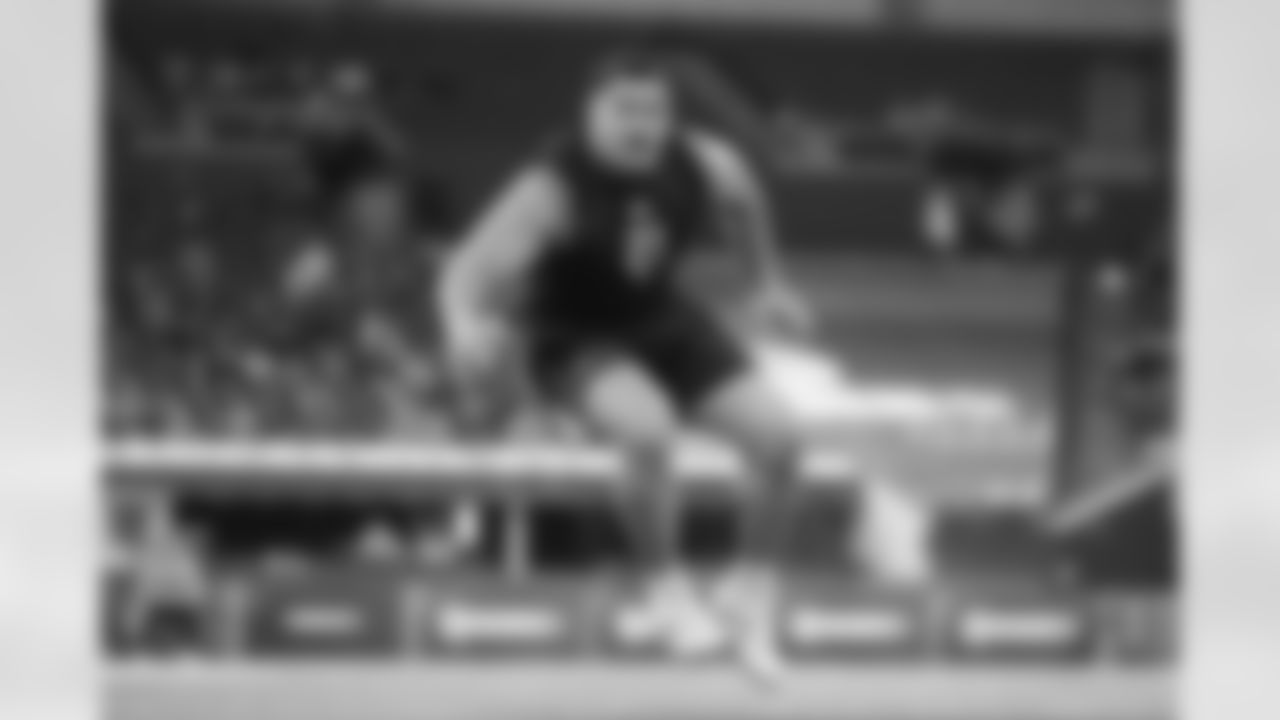 Wake Forest offensive lineman Fa'alili Fa'amoe (21) runs a drill at the NFL football scouting combine in Indianapolis, Sunday, March 1, 2026. (AP Photo/Michael Conroy)