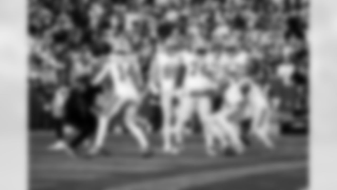 Detroit Lions wide receiver Amon-Ra St. Brown (14), Detroit Lions tight end Brock Wright (89), Detroit Lions guard Kayode Awosika (74), Detroit Lions wide receiver Jameson Williams (1), Detroit Lions offensive lineman Tate Ratledge (69), and Detroit Lions running back Jahmyr Gibbs (0) celebrate after a touchdown during an NFL football game against the Washington Commanders on Sunday, Nov. 9, 2025 in Landover, Md. (Jeff Nguyen/Detroit Lions via AP)