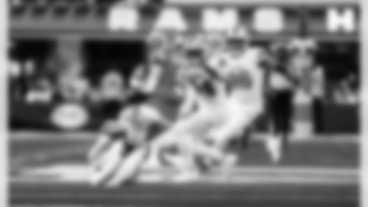 Detroit Lions edge rusher Aidan Hutchinson (97) and Detroit Lions linebacker Alex Anzalone (34) sack Los Angeles Rams quarterback Matthew Stafford (9) during an NFL football game against the Los Angeles Rams on Sunday, Dec. 14, 2025 in Inglewood, Calif. (Jeff Nguyen/Detroit Lions via AP)