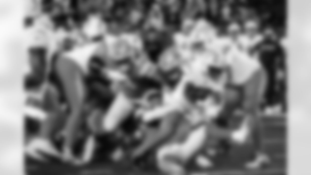 Detroit Lions defensive lineman Keith Cooper Jr. (64) and Detroit Lions edge rusher Ahmed Hassanein (61) during an NFL football game against the Los Angeles Chargers, Thursday, July 31, 2025, in Canton, Ohio. (Jeff Nguyen/Detroit Lions via AP)