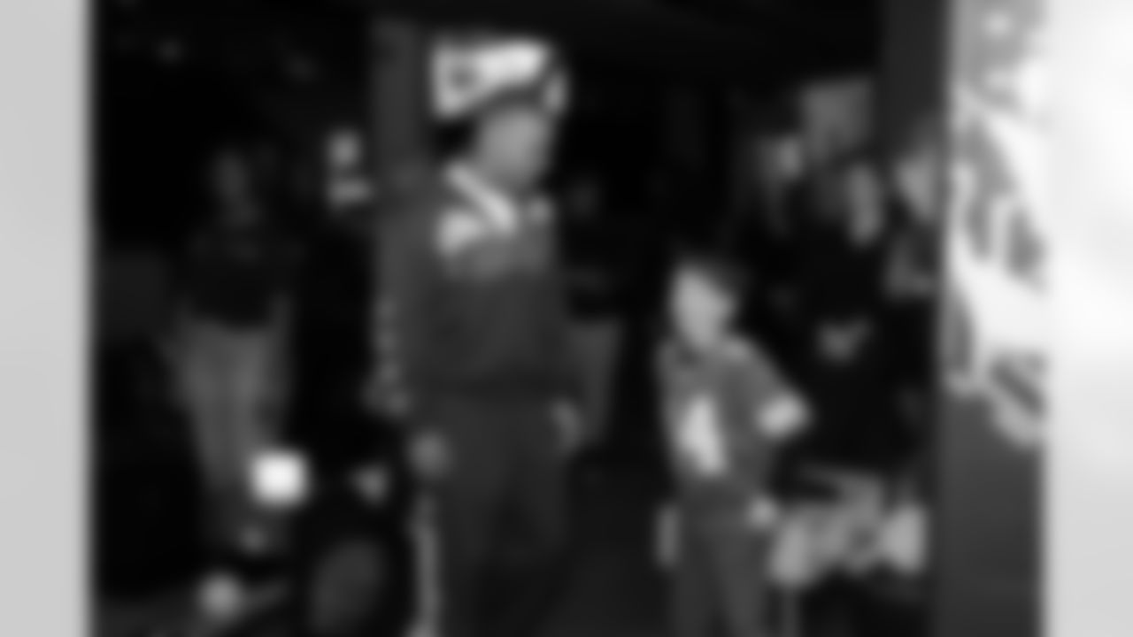 Detroit Lions wide receiver Amon-Ra St. Brown (14) greets guests during a Strike for Literacy event at Five Iron Golf on Nov. 3, 2025 in Detroit.(Carl Jones II/Detroit Lions)