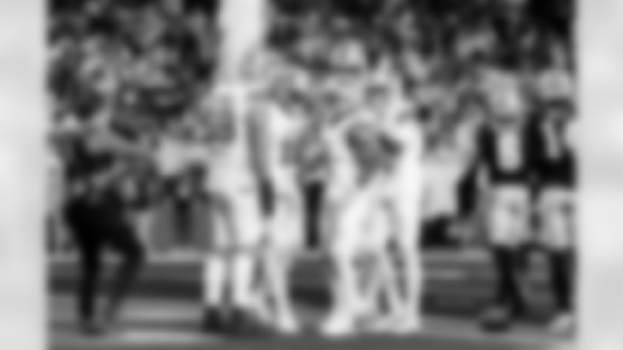 Detroit Lions offensive lineman Tate Ratledge (69), Detroit Lions wide receiver Isaac TeSlaa (18), Detroit Lions running back Jahmyr Gibbs (0), and Detroit Lions wide receiver Jameson Williams (1) celebrate after a touchdown during an NFL football game against the Dallas Cowboys on Thursday, Dec. 4, 2025 in Detroit. (Jeff Nguyen/Detroit Lions via AP)