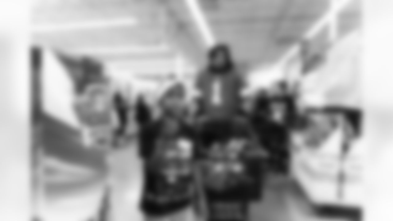 Participant shopping during Shop with a Lion at Meijer on Dec. 8, 2025 in Detroit. (Stephanie VanWagoner/Detroit Lions)