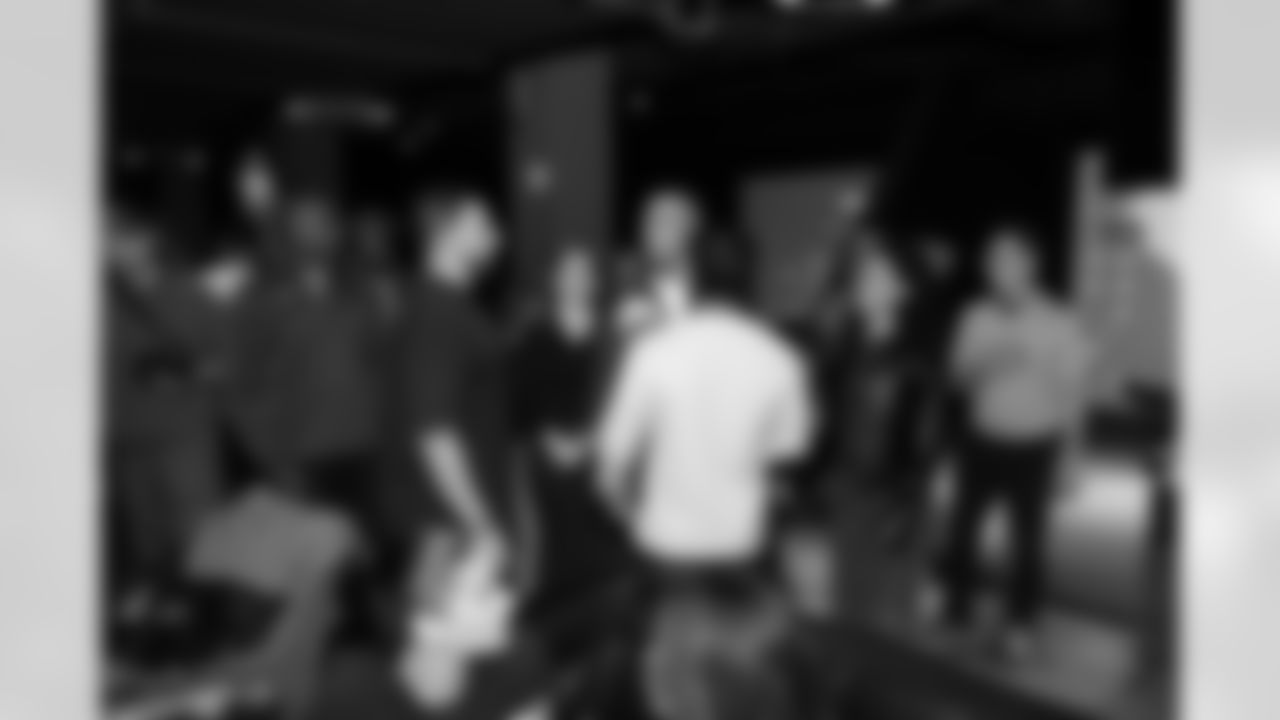 Detroit Lions wide receiver Amon-Ra St. Brown (14) greets guests during a Strike for Literacy event at Five Iron Golf on Nov. 3, 2025 in Detroit.(Carl Jones II/Detroit Lions)