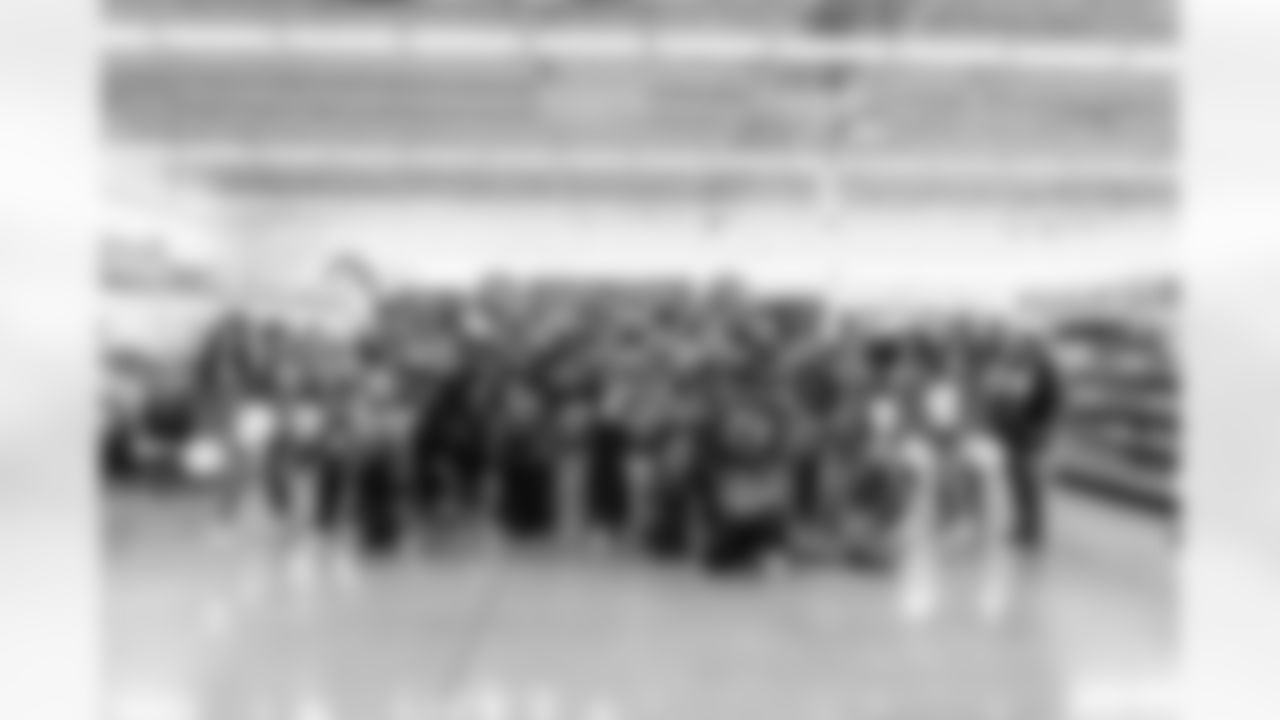 Detroit Lions Cheerleaders, Lions Legend Eric Hipple (17), Lions Legend Jeff Backus (76), Lions Legend Rob Sims (67), Detroit Lions wide receiver Dominic Lovett (19), Detroit Lions defensive lineman Tyler Lacy (78), Detroit Lions wide receiver Amon-Ra St. Brown (14), Detroit Lions linebacker Grant Stuard (15), Detroit Lions offensive lineman Miles Frazier (71), Detroit Lions offensive lineman Devin Cochran (77), Detroit Lions edge rusher Ahmed Hassanein (61), Detroit Lions Detroit Lions offensive lineman Trystan Colon (57), Detroit Lions safety Daniel Thomas (2), Detroit Lions wide receiver Jameson Williams (1)Detroit Lions running back Jahmyr Gibbs (0), Detroit Lions Cheerleaders, Detroit Lions Mascot Roary during Shop with a Lion at Meijer on Dec. 8, 2025 in Detroit. (Stephanie VanWagoner/Detroit Lions)