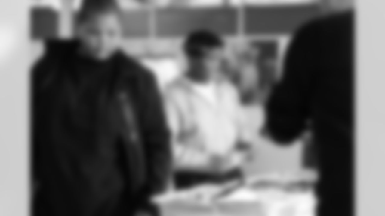 A student getting lunch during the Presents from the Pride event at Detroit Lions Academy on Dec. 16, 2025 in Detroit. (Izzy Rincon/Detroit Lions)