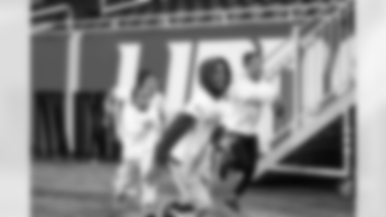 Participants taking the field during the Inspire Change Football Clinic at Ford Field on Dec. 9, 2025 in Detroit. (Izzy Rincon/Detroit Lions)