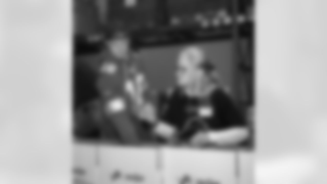 Detroit Lions wide receiver Isaac TeSlaa (18) and a Meijer volunteer packing boxes during a Thanksgiving meal packing event at Gleaners Community Food Bank on Nov. 11, 2025 in Taylor, Mich. (Izzy Rincon/Detroit Lions)