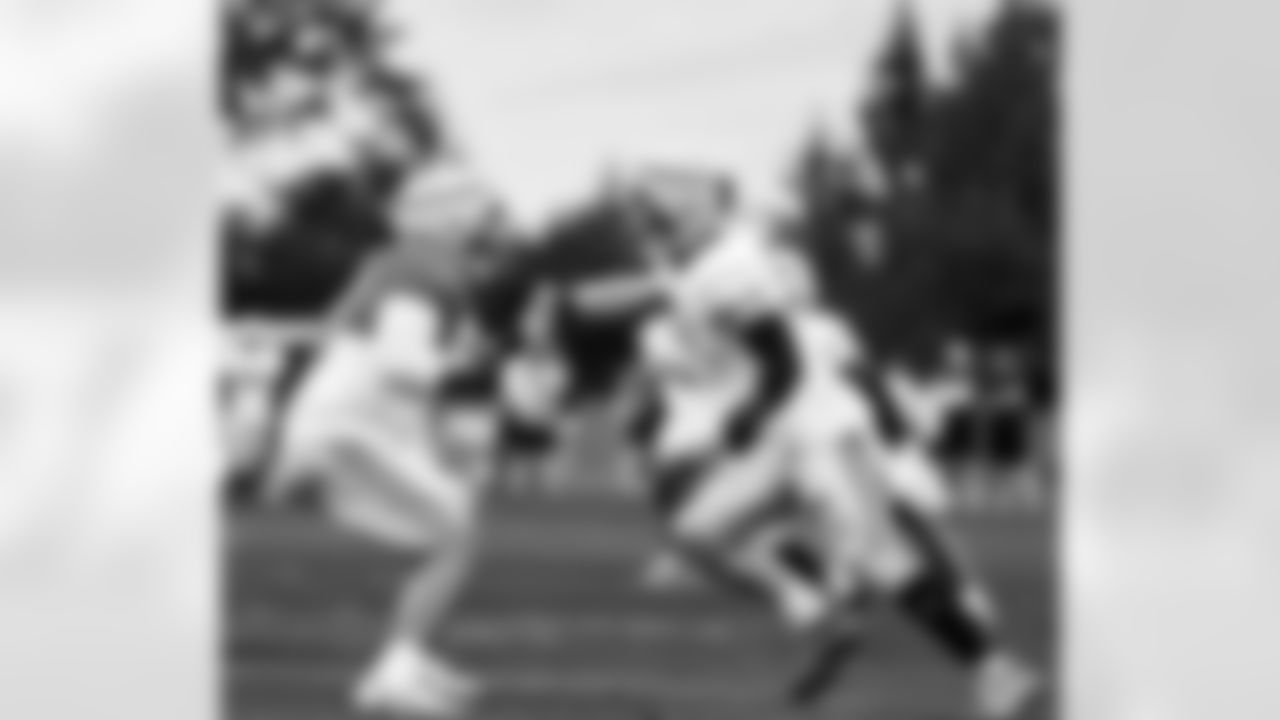 Detroit Lions tackle Penei Sewell (58) and Detroit Lions edge rusher Aidan Hutchinson (97) during training camp at the Meijer Performance Center on July 25, 2025 in Allen Park, Mich. (Jeff Nguyen/Detroit Lions)