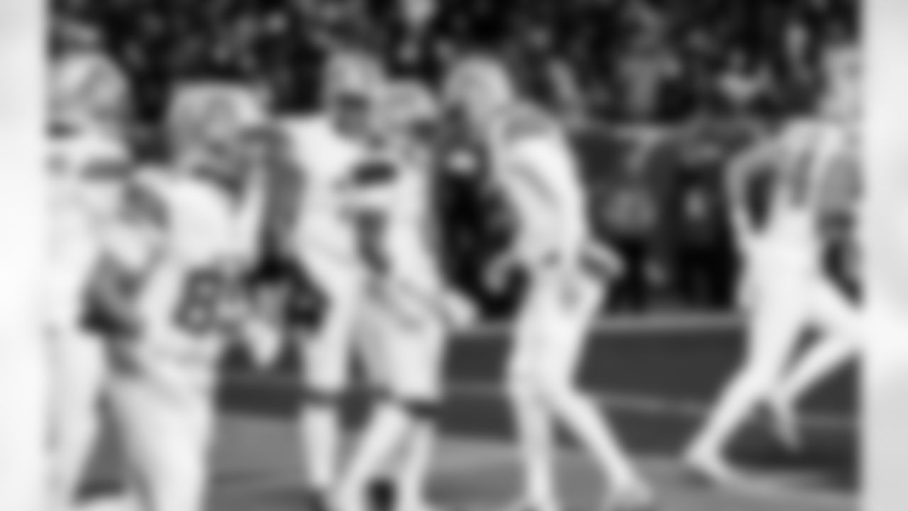 Detroit Lions running back Jahmyr Gibbs (0) and Detroit Lions quarterback Jared Goff (16) celebrate after a touchdown during an NFL football game against the Chicago Bears on Sunday, Jan. 4, 2026 in Chicago. (Jeff Nguyen/Detroit Lions via AP)