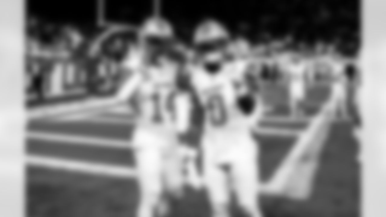 Detroit Lions wide receiver Amon-Ra St. Brown (14) and Detroit Lions running back Jahmyr Gibbs (0) before an NFL football game against the Dallas Cowboys on Thursday, Dec. 4, 2025 in Detroit. (Jeff Nguyen/Detroit Lions via AP)