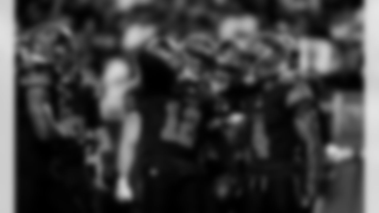 Detroit Lions safety Thomas Harper (12) and Detroit Lions cornerback D.J. Reed (4) celebrate after an interception during an NFL football game against the New York Giants on Sunday, Nov. 23, 2025 in Detroit. (Jeff Nguyen/Detroit Lions via AP)