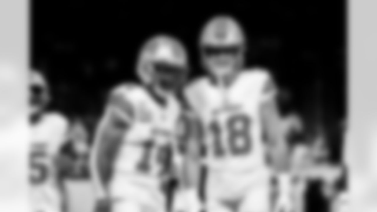 Detroit Lions wide receiver Amon-Ra St. Brown (14) and Detroit Lions wide receiver Isaac TeSlaa (18) before an NFL football game against the Dallas Cowboys on Thursday, Dec. 4, 2025 in Detroit. (Jeff Nguyen/Detroit Lions via AP)