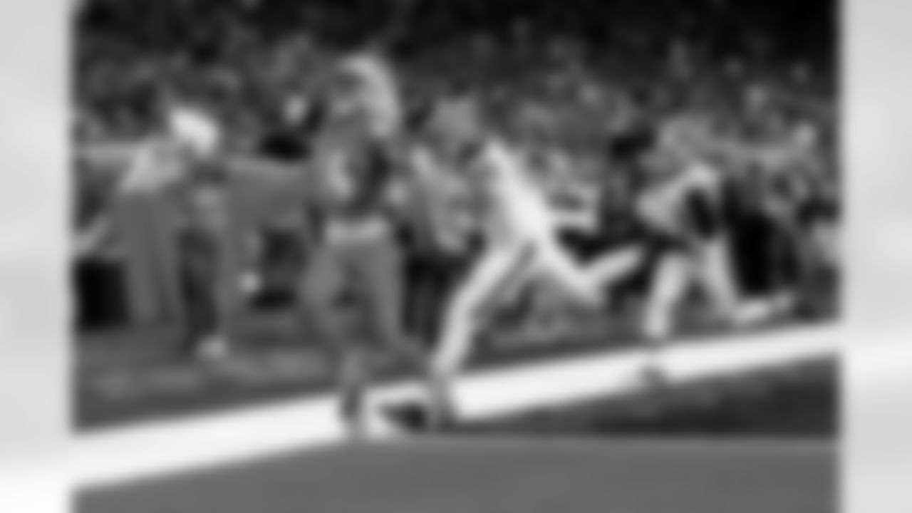 Detroit Lions wide receiver Amon-Ra St. Brown (14) scores a touchdown during an NFL football game against the Cleveland Browns on Sunday, Sept. 28, 2025 in Detroit. (Jeff Nguyen/Detroit Lions via AP)