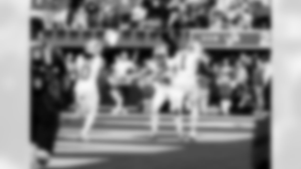 Detroit Lions running back Jahmyr Gibbs (0), Detroit Lions wide receiver Amon-Ra St. Brown (14), and Detroit Lions wide receiver Jameson Williams (1) celebrate after scoring a touchdown during an NFL football game against the Los Angeles Rams on Sunday, Dec. 14, 2025 in Inglewood, Calif. (Jeff Nguyen/Detroit Lions via AP)
