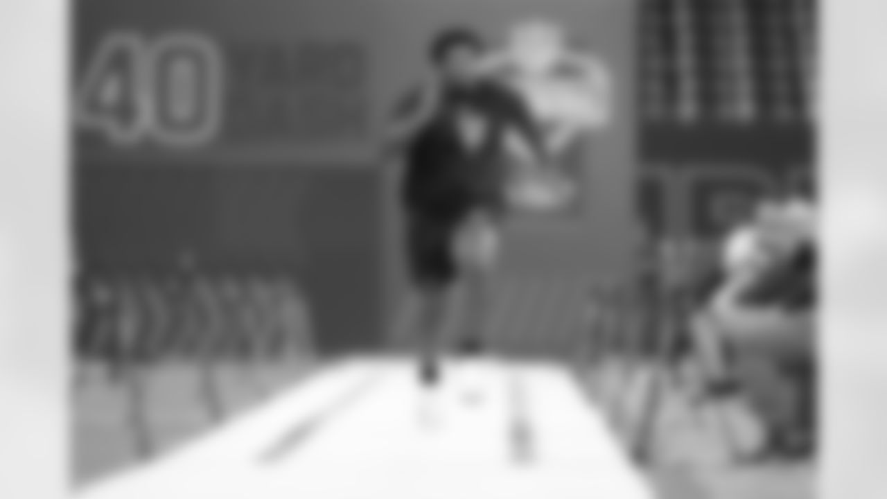 Auburn offensive lineman Dillon Wade (52) runs a drill at the NFL football scouting combine in Indianapolis, Sunday, March 1, 2026. (AP Photo/Michael Conroy)