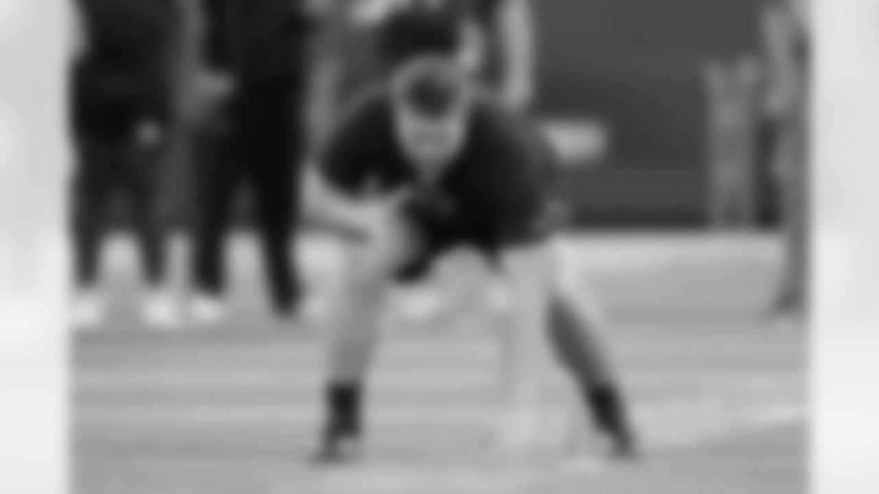 Texas A&M offensive lineman Trey Zuhn III (57) runs a drill at the NFL football scouting combine in Indianapolis, Sunday, March 1, 2026. (AP Photo/Michael Conroy)