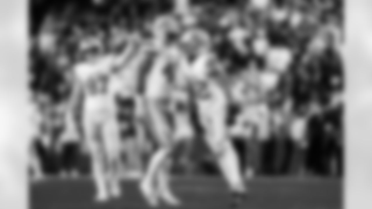 Detroit Lions linebacker Jack Campbell (46) and Detroit Lions defensive back Brian Branch (32) celebrates after a sack during an NFL football game against the Washington Commanders on Sunday, Nov. 9, 2025 in Landover, Md. (Jeff Nguyen/Detroit Lions via AP)