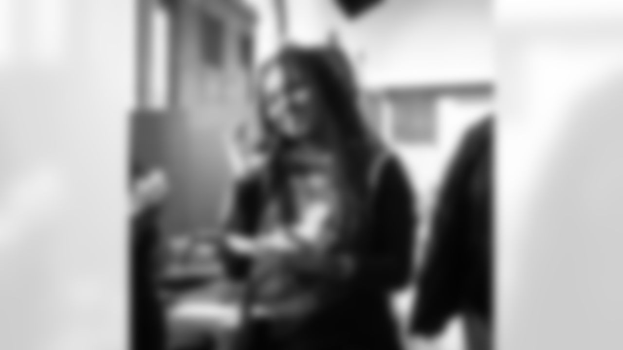 A student smiling with 3D printed materials during a Detroit Lions Academy health and wellness field trip at the Henry Ford Health campus on Feb. 27, 2026 in Detroit. (Izzy Rincon/Detroit Lions)