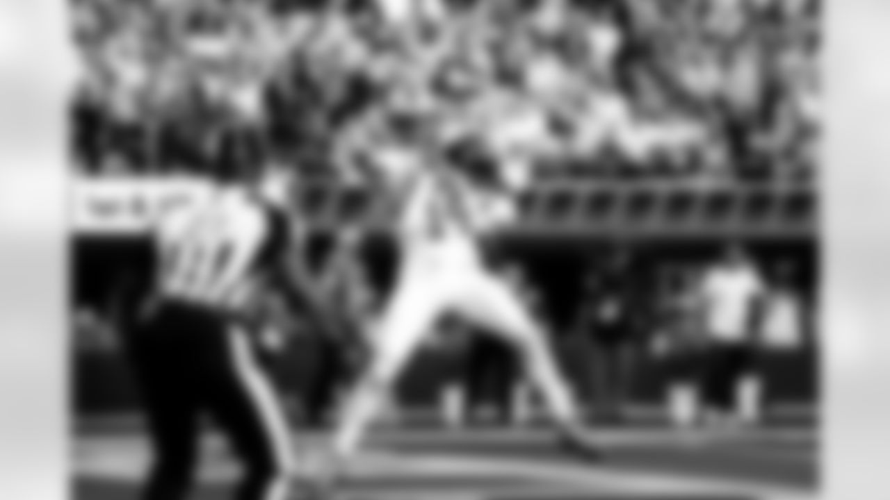 Detroit Lions wide receiver Amon-Ra St. Brown (14) catches the ball and scores a touchdown during an NFL football game against the Los Angeles Rams on Sunday, Dec. 14, 2025 in Inglewood, Calif. (Jeff Nguyen/Detroit Lions via AP)