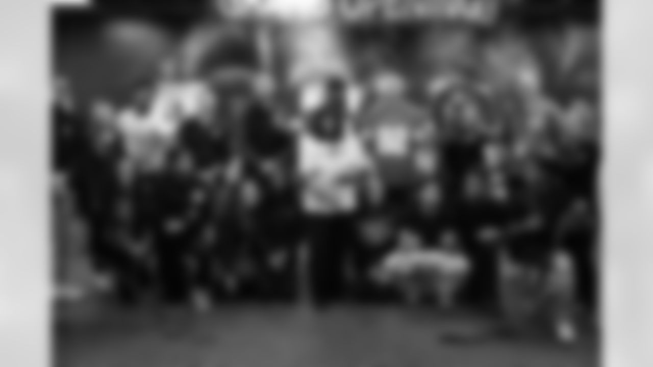 Lions Legend Alex Lewis (59), Lions Legend Eric Stocz (82), DLA Principal Ms. King, Detroit Lions Mascot Roary, Detroit Lions Vice President of Detroit Lions Foundation and Community Relations Roxanne Caine, Detroit Lions Foundation Program Officer Terrance Thomas and DLA staff and students during the UDIM & Planet Fitness Health and Wellness room reveal during a Count Day activation event at Detroit Lions Academy on Feb. 11, 2026 in Detroit. (Carl Jones II/Detroit Lions)