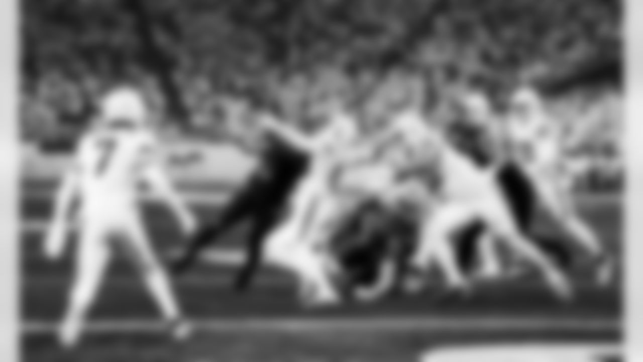 Detroit Lions running back David Montgomery (5), Detroit Lions tight end Anthony Firkser (86), and Detroit Lions guard Kayode Awosika (74) during an NFL football game against the Minnesota Vikings on Thursday, Dec. 25, 2025 in Minneapolis. (Jeff Nguyen/Detroit Lions via AP)