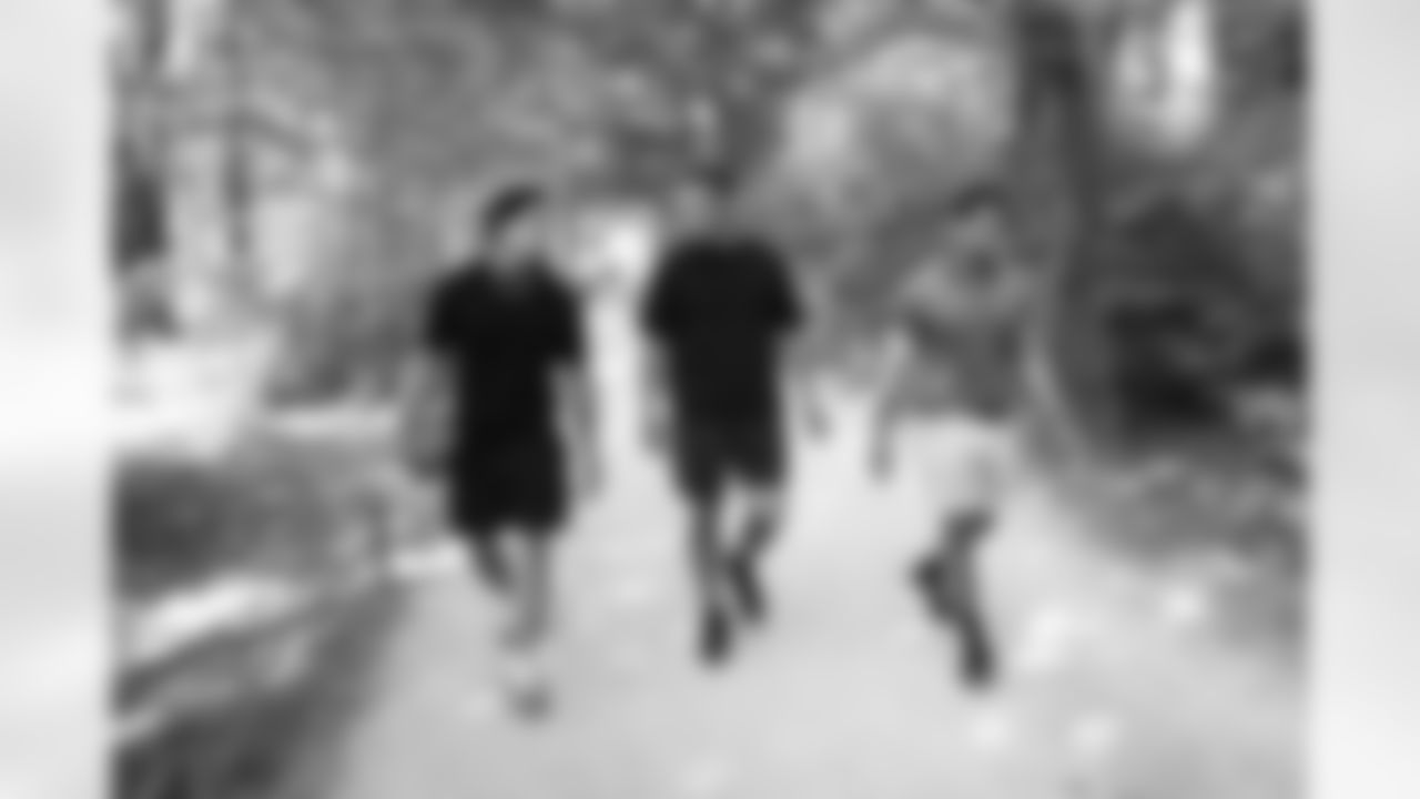 Detroit Lions running back Craig Reynolds (13) along with wide receivers Amon-Ra St. Brown (14) and Kalif Raymond (11) at Englischen Garten on June 20, 2025 in Munich, Germany. (Stuart Zaas/Detroit Lions)